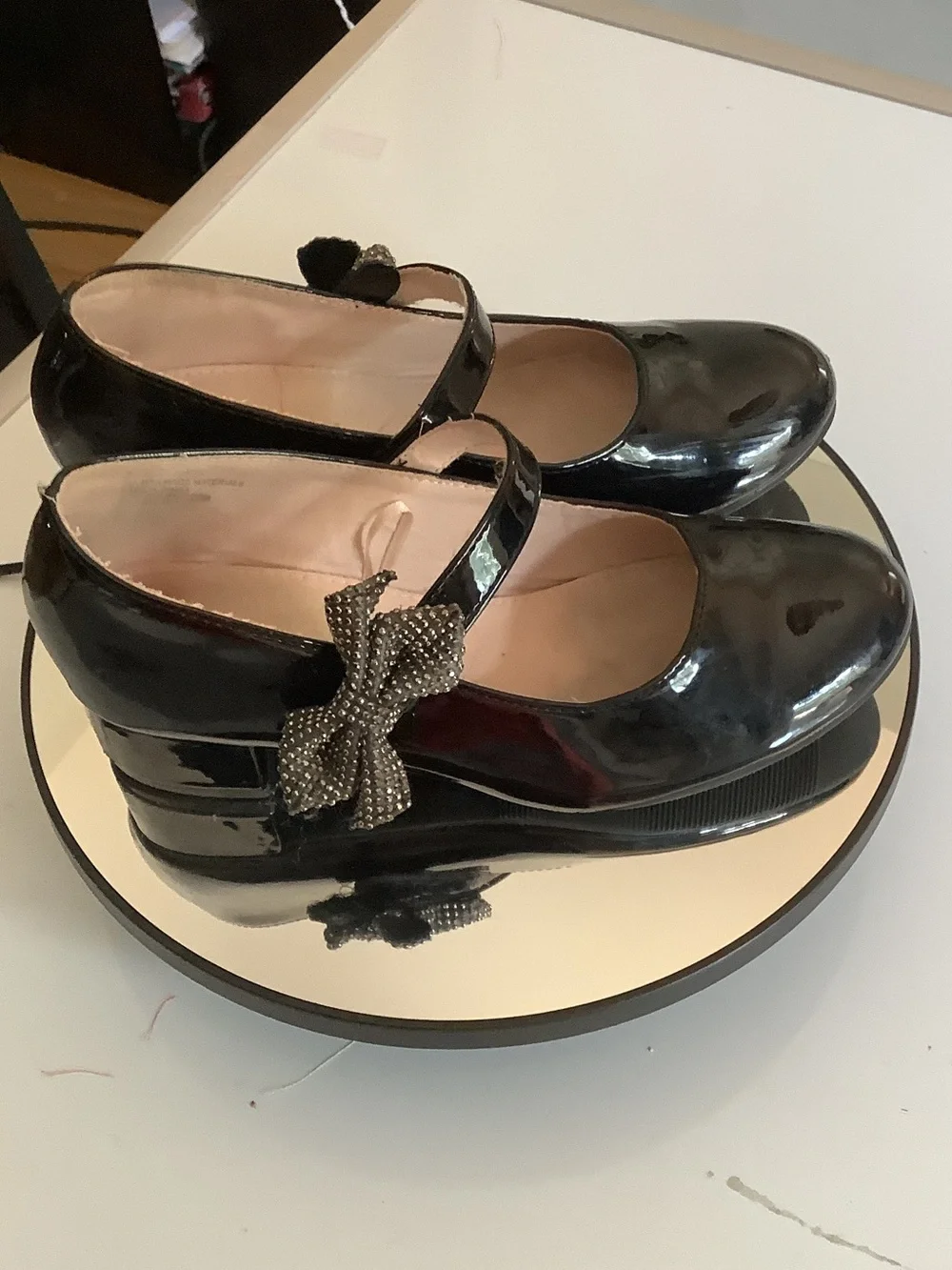 cupcakes & cashmere Black Patent Mary Jane Wedges with Embellished Bow